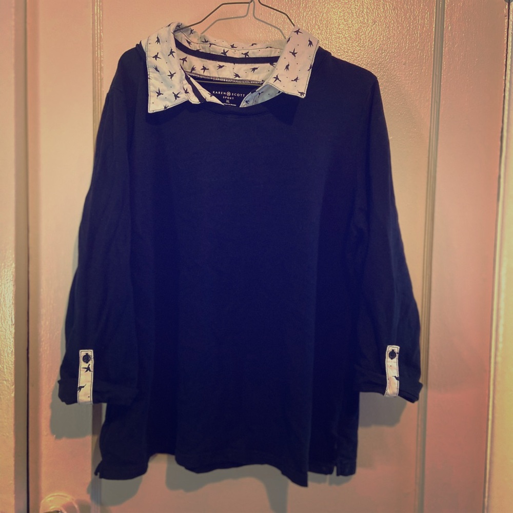 Black top with white collar.